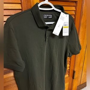 Calvin Klein Liquid Touch men’s Polo. Size Med. Brand new with tags. Plus more.